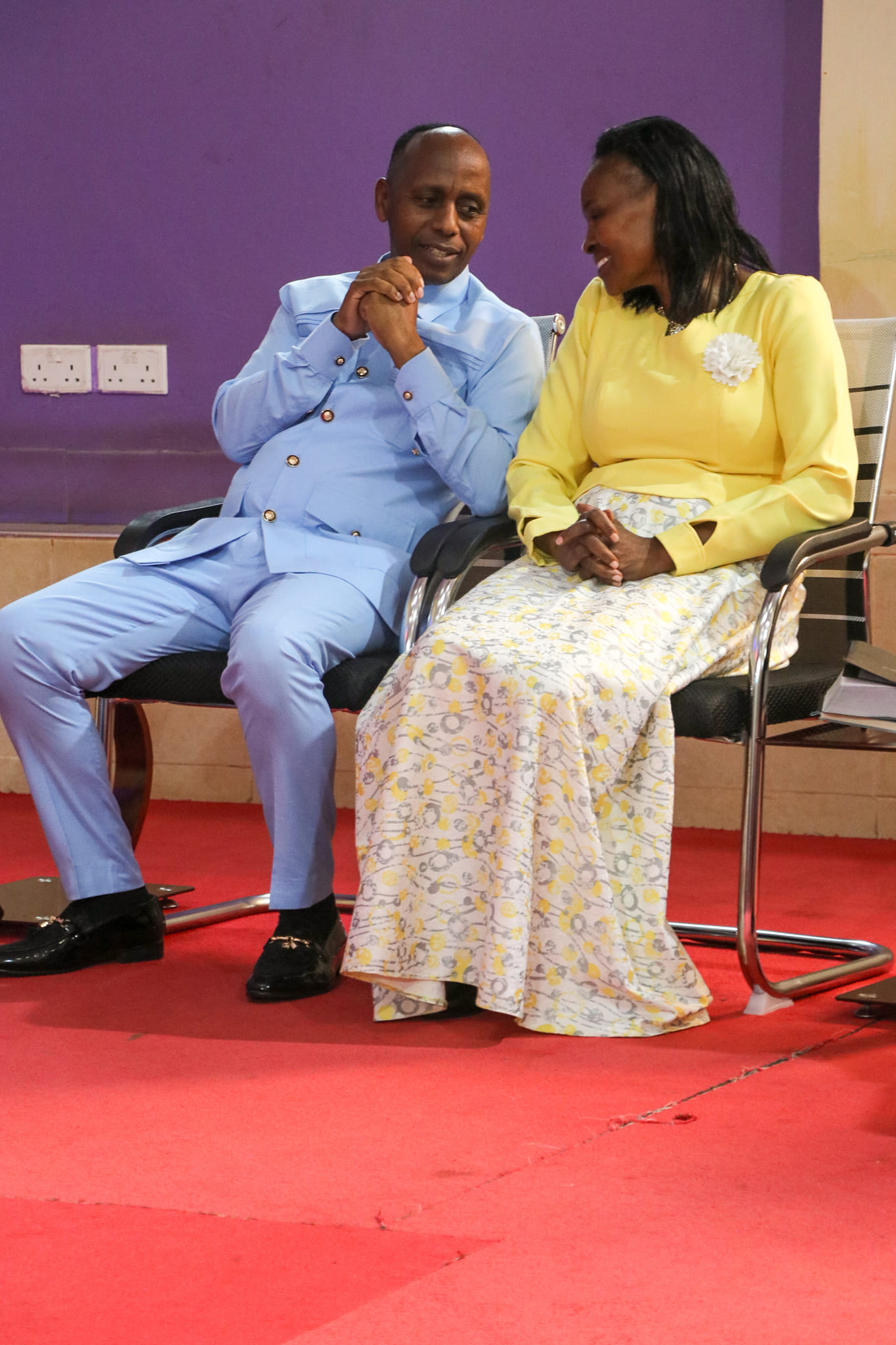 sharing jokes with his wife